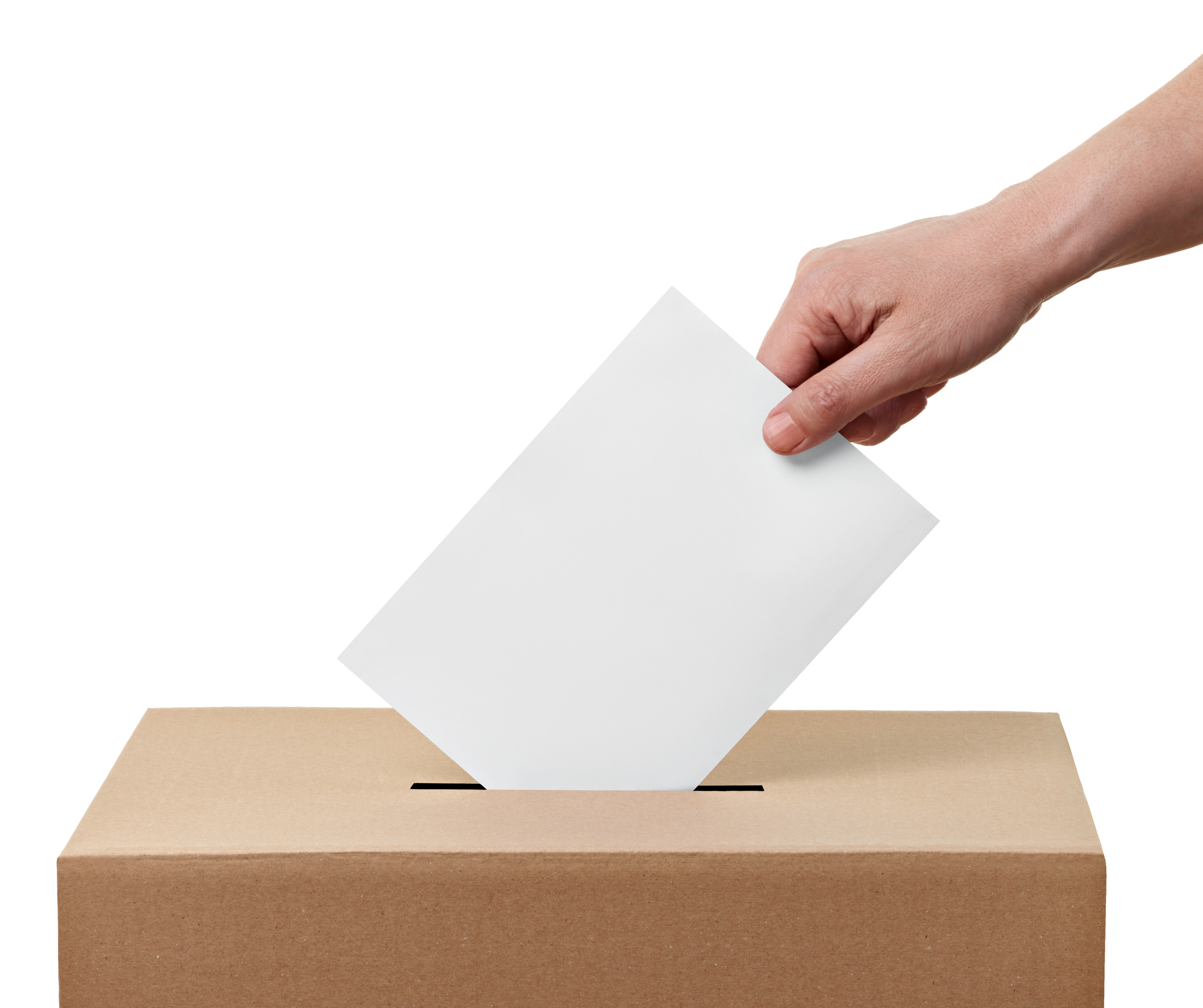 Man sieht eine Hand, die einen Zettel in den Schlitz einer Wahlurne steckt
